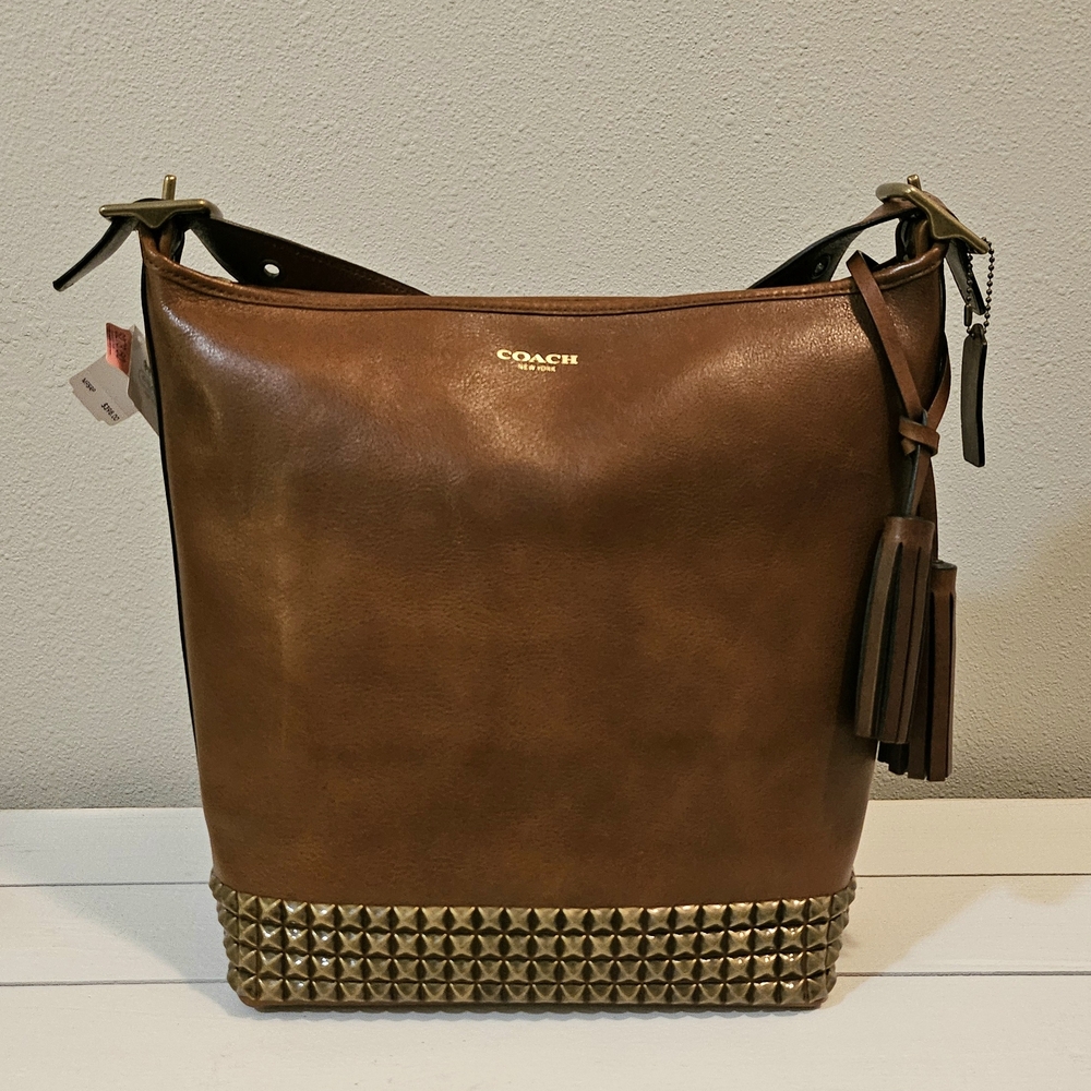 NWT Coach Legacy Archival Duffle in studded leather, caramel-brown, MFSRP $398